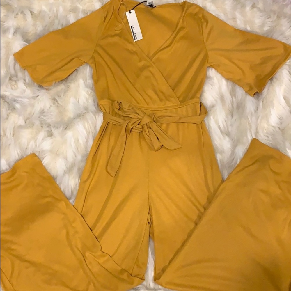 Women Brand New size M mustard jumpsuit
